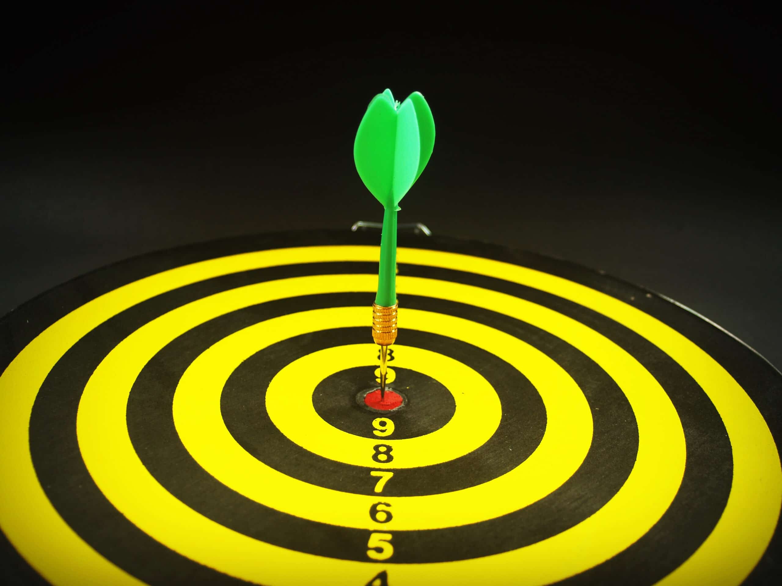 Dartboard target aim goal achievement concept